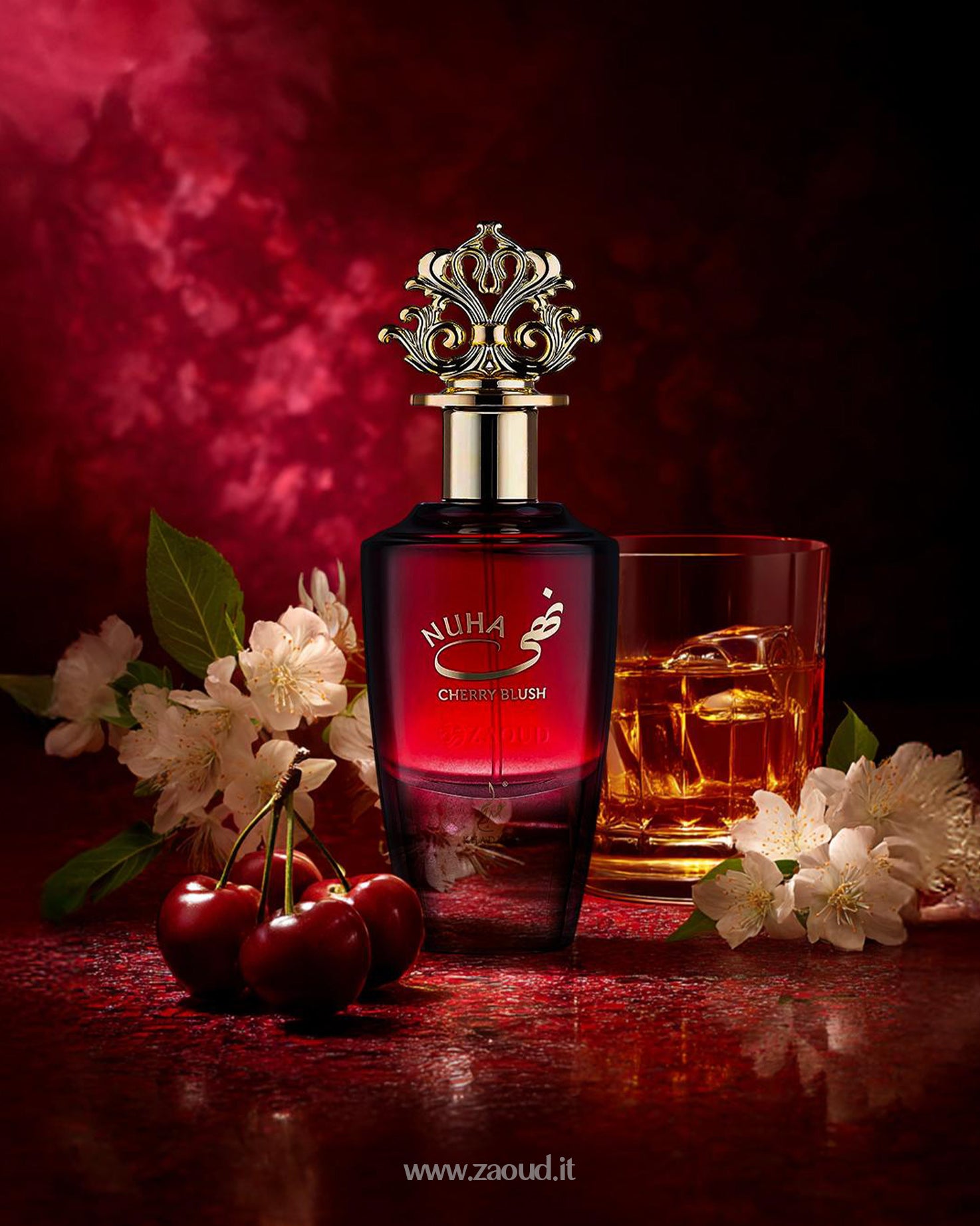 NUHA Cherry Blush by Khadlaj A luxurious cherry and floral perfume with a rich golden crown cap, set against a deep red background with cherries and a glass of whiskey, evoking warmth and elegance.