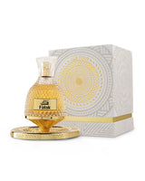 nusuk falak perfume bottle shows beside packaging against white background