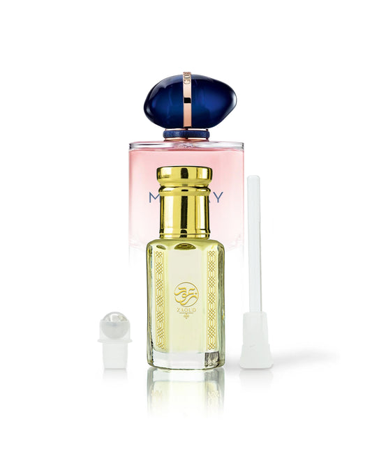 oktavia perfume oil bottle beside roller and stick with armani my way perfume bottle behind shows against white background