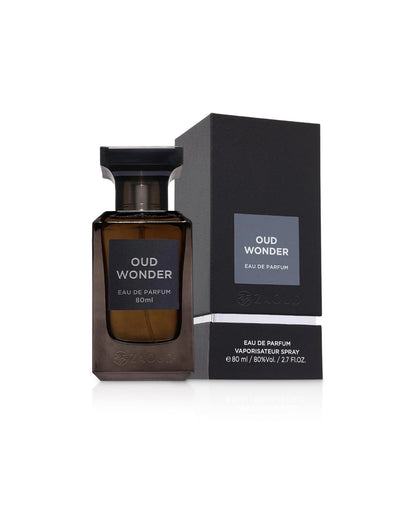 oud wonder perfume bottle shows beside its box against white background