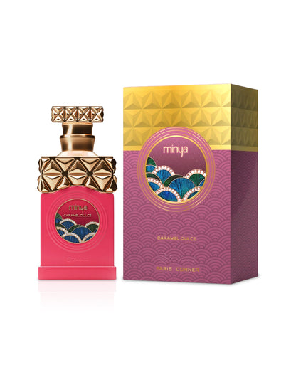 paris corner minya caramel dulce Pink perfume bottle with gold cap and matching box on a white background