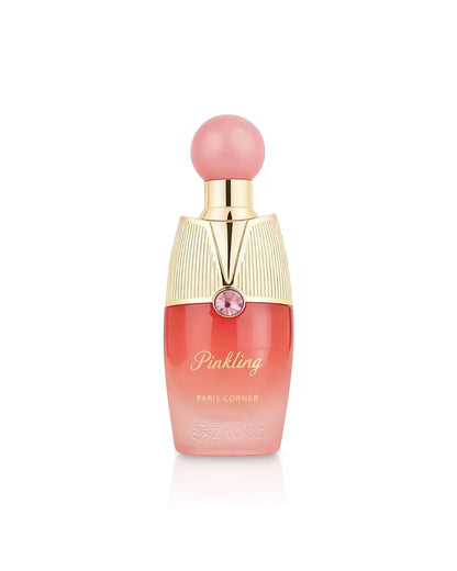paris corner pinkling perfume bottle shows against white background 