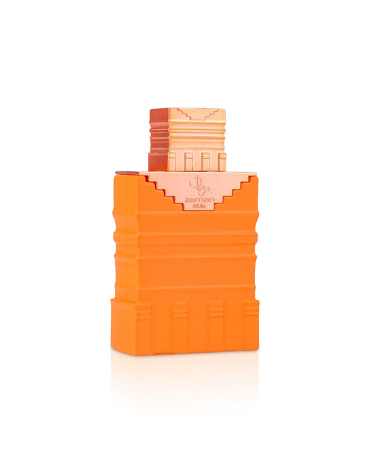 paris corner zaman al ula Orange perfume bottle with a gold cap on a white background