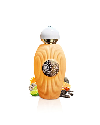 paris corner khayal perfume bottle surrounded with fragrance notes like woods and amber show from behind the bottle against white background