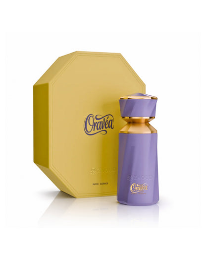 paris corner oravea perfume bottle shows beside its packaging against white background