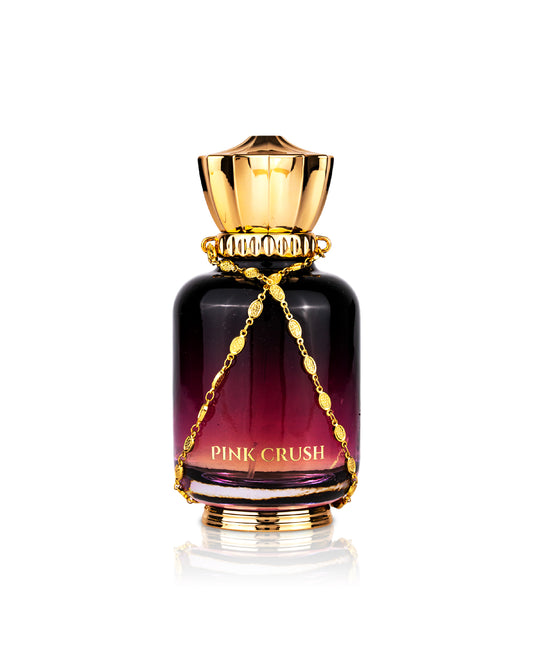 MAISON ASRAR Perfume bottle labeled 'Pink Crush' with gold cap and chain on a white background