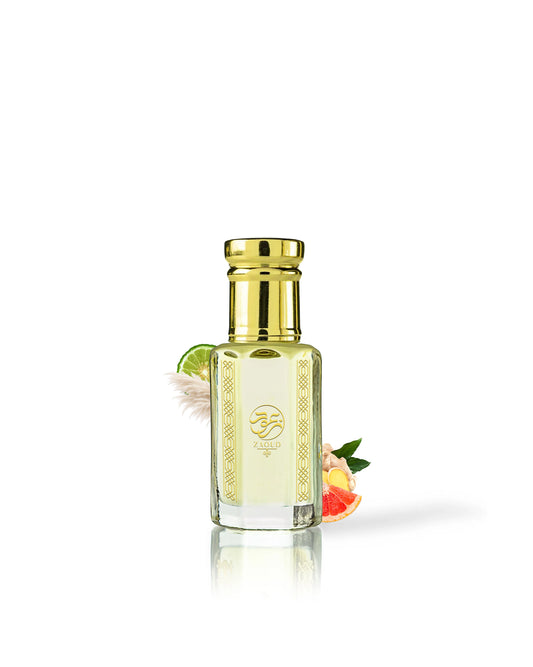 pomela perfume oil bottle with a shiny gold cap and gold decorative patterns, filled with pale yellow liquid. The bottle is centered on a white background with a soft reflection, decorated with a lime wedge, white flower, and citrus slice.