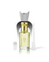 Pomela perfume OIL bottle with a shiny gold cap and gold decorative print, shown with a silver atomizer cap and a white applicator wand on a clean white background.