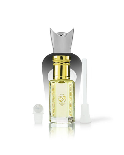 Pomela perfume OIL bottle with a shiny gold cap and gold decorative print, shown with a silver atomizer cap and a white applicator wand on a clean white background.
