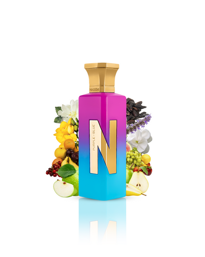 purple blue aqua parfum bottle surrounded by apple tonka against white background