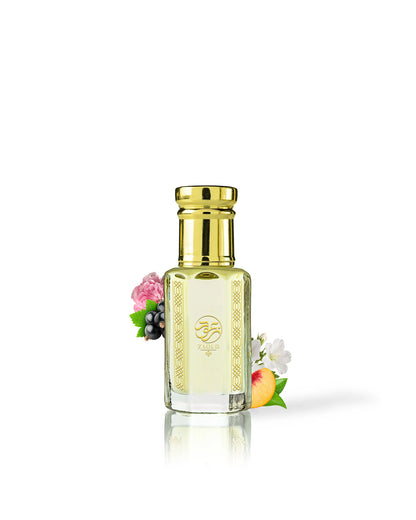 rawza perfume oil bottle with a shiny gold cap and gold decorative borders, filled with pale yellow liquid. The bottle is centered on a white background with a soft reflection below, and small decorative flowers and fruit are placed near the base.