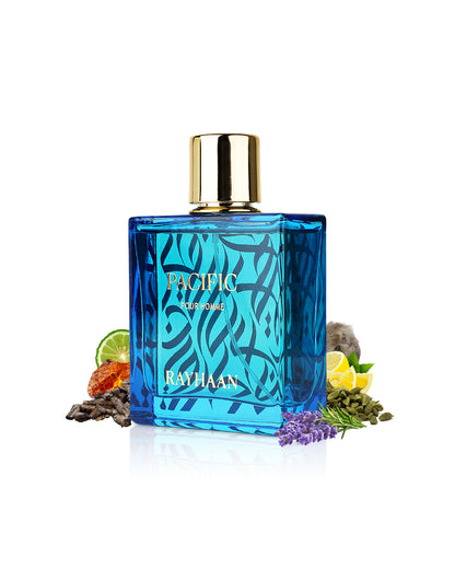 rayhaan pacific perfume botlle surrounded with its ingredients like amber and citrus beside many others like cardamom and lavender shows from behind the bottle against white background