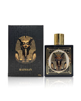 rayhaan pharaoh perfume bottle shows beside its packaging against white background