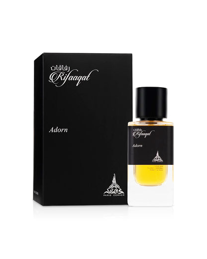 rifaaqat adorn by paris corner perfume bottle shows beside its box  against white background