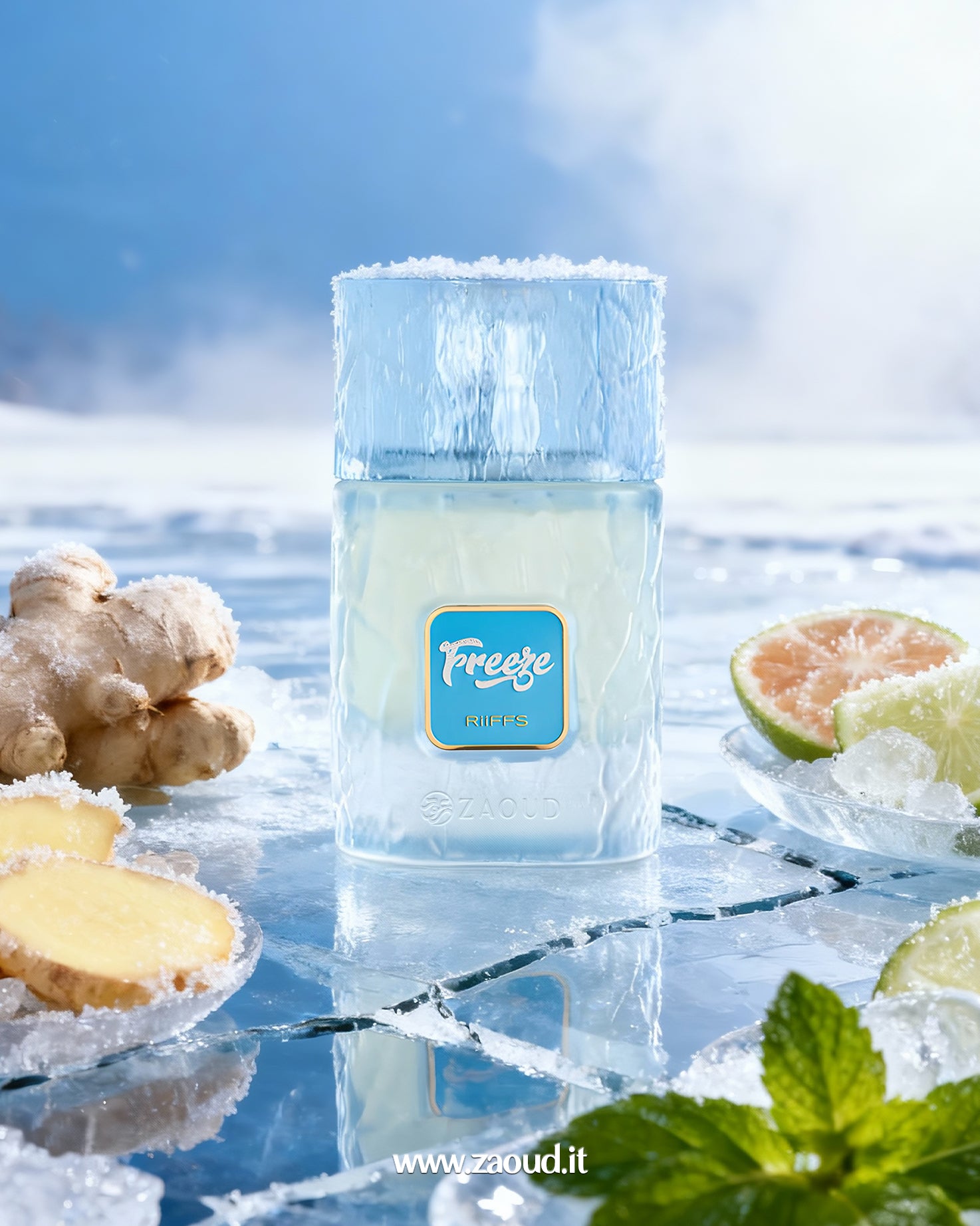 Close-up of the "Freeze RIIFFS" Eau de Parfum bottle, featuring frosted blue glass and a cap dusted with snow or ice, set dramatically on a cracked, reflective ice surface. Ingredients symbolizing the cold, zesty notes including fresh ginger root, grapefruit and lime slices on ice, and mint leaves are arranged around the bottle. The background suggests a vast, frozen arctic environment.