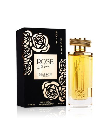 maison asrar rose honeyperfume bottle shows beside its box against white background