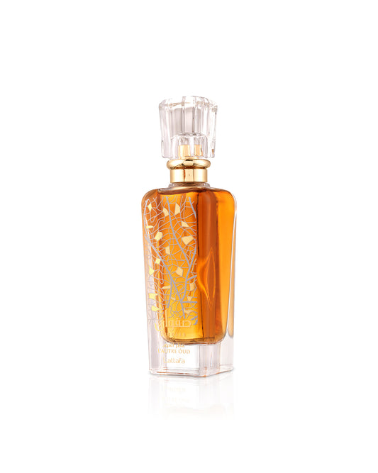 LATTAFA SAFWAAN L'AUTRE OUD Perfume bottle with gold cap and decorative label on a white background