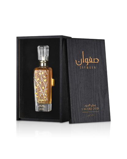 lattafa safwaan lautre oud perfume bottle shows from opned its wooden box  against white background