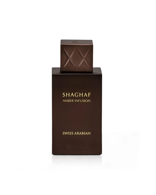 Brown perfume bottle labeled 'Shaghaf Amber Infusion' by Swiss Arabian on a white background