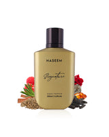 signature gold aqua parfum by naseem perfumes bottle surrounded with its ingredients like amber and tonkabeans with many others like rose and musk shows from behind the bottleagainst white background