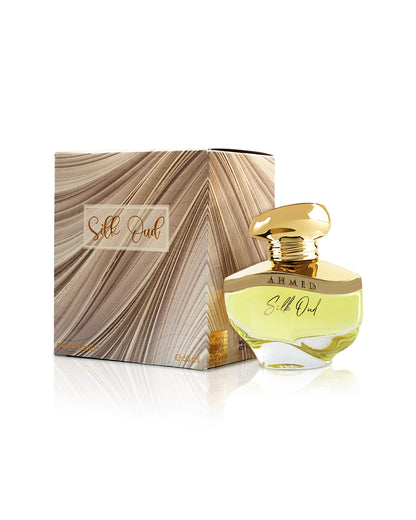 ahmed al maghribi silk oud perfume bottle shows beside its box against white background