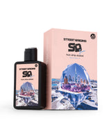 street rigins hot drip dubai perfume bottle beside its packaging shows against white background