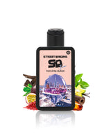 street rigins hot drip dubai perfume bottle surrounded by fragrance notes like passion fruit and leather  shows against white background