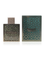 terra rayhaan perfume bottle shows beside packaging against white background