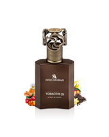 swiss arabian tobacco 01 perfume bottle surrounded with fragrance notes like amber and vanilla shows from behind the bottle against white background