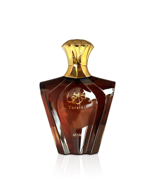 AFNAN TURATHI Brown perfume bottle with gold cap on a white background