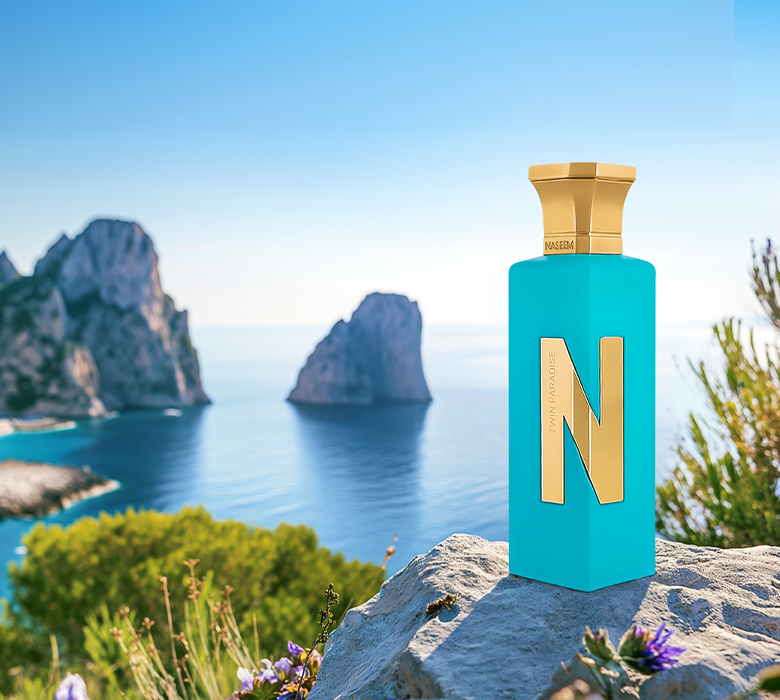 twin paradise perfume bottle by naseem perfumes photograph banner over mountain at capri island in napoli italy