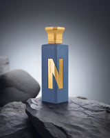 urban beat aqua parfum bottle photograph gray rock
