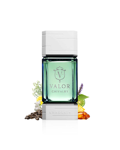 valor chivalry by khadlaj perfumes bottle surrounded with its ingredients like citrus and amber with many others shows from behind the bottle against white background 