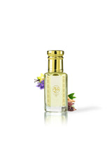 VANILLA MALEKA Gold and clear bottle with decorative elements LIKE CACAO AND VANILLA on a white background