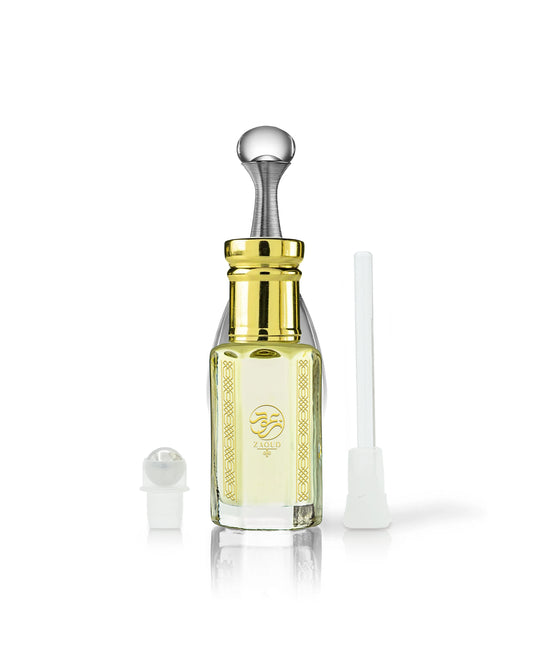 venus perfume oil bottle with a shiny gold neck and silver dropper cap, shown on a white background with a small white cap off to the left and a white applicator tube to the right.