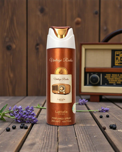 Lattaafa Vintage Radio deodorant spray bottle with vintage radio design on a wooden surface with lavender and berries.