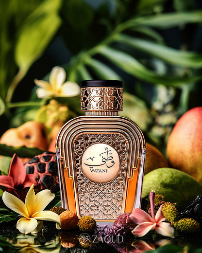 watani eau de parfum bottle photograph surrounded with tropical fruits and white flowers over water surface.