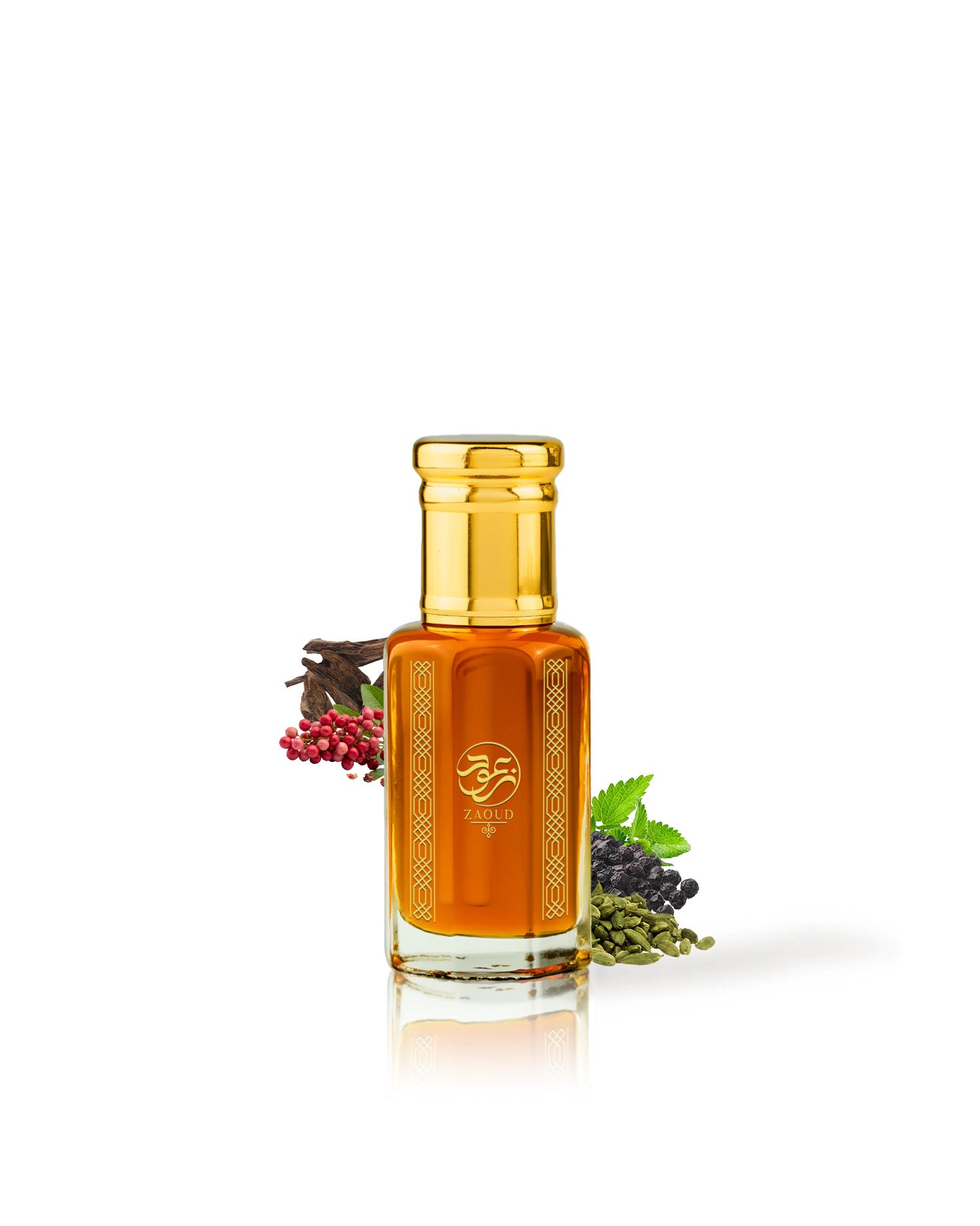 zaoud perfume oil bottle filled with amber-orange liquid, topped with a shiny gold cap, centered on a white background with small botanical ingredients placed near the base.