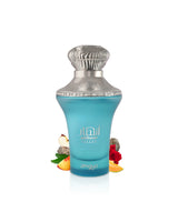 zimaya anhaar valley blue perfume bottle surrounded with fruits and rose with silver cap on a white background