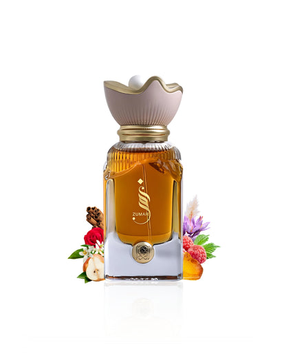 zumar ahmed al maghribi perfume bottle surrounded with fragrance notes like pear and saffron shows against white background